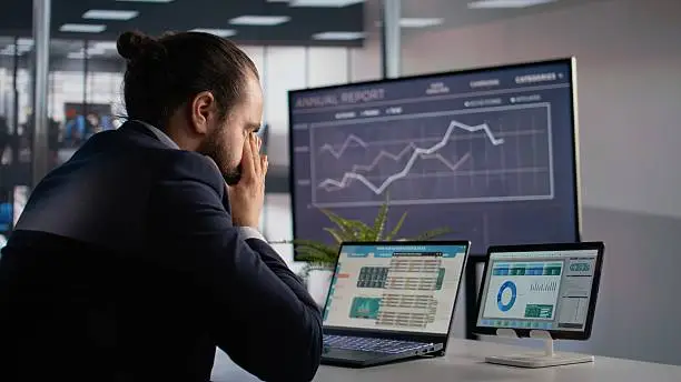 Sales manager reviewing a falling outbound contact rate caused by spam labels